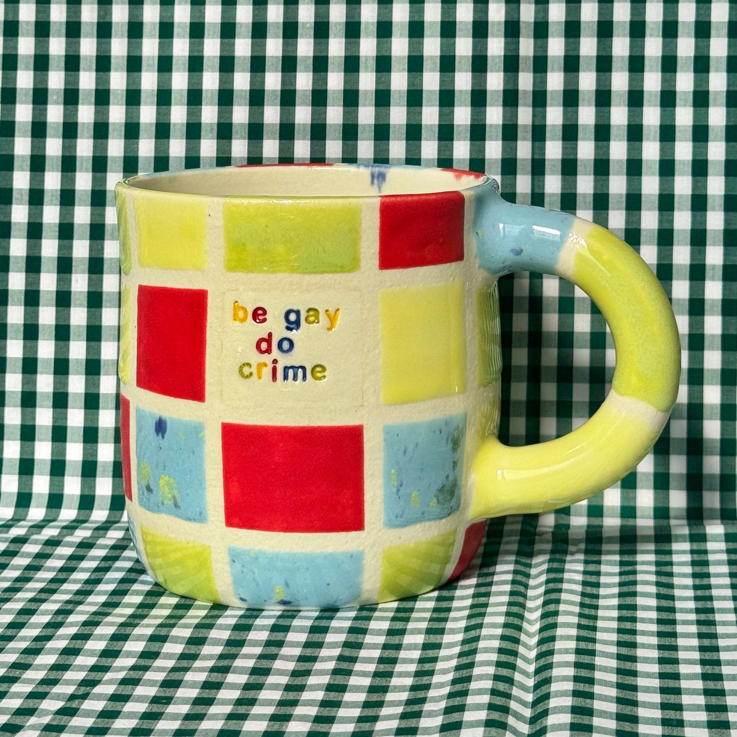 SECONDS - Be Gay Do Crime Mug - rainbow gingham large
